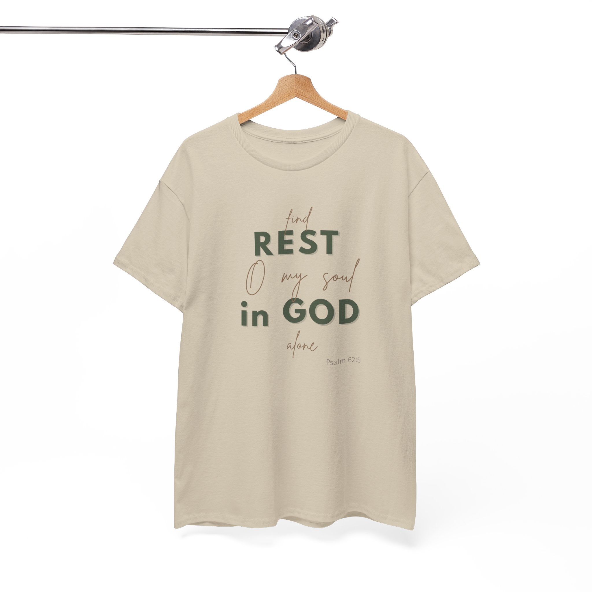 Beige t-shirt featuring the phrase “Find rest, O my soul in God alone” with “Psalm 62:5” displayed below, designed in soft sage green and neutral beige lettering for a calm, minimalist look.