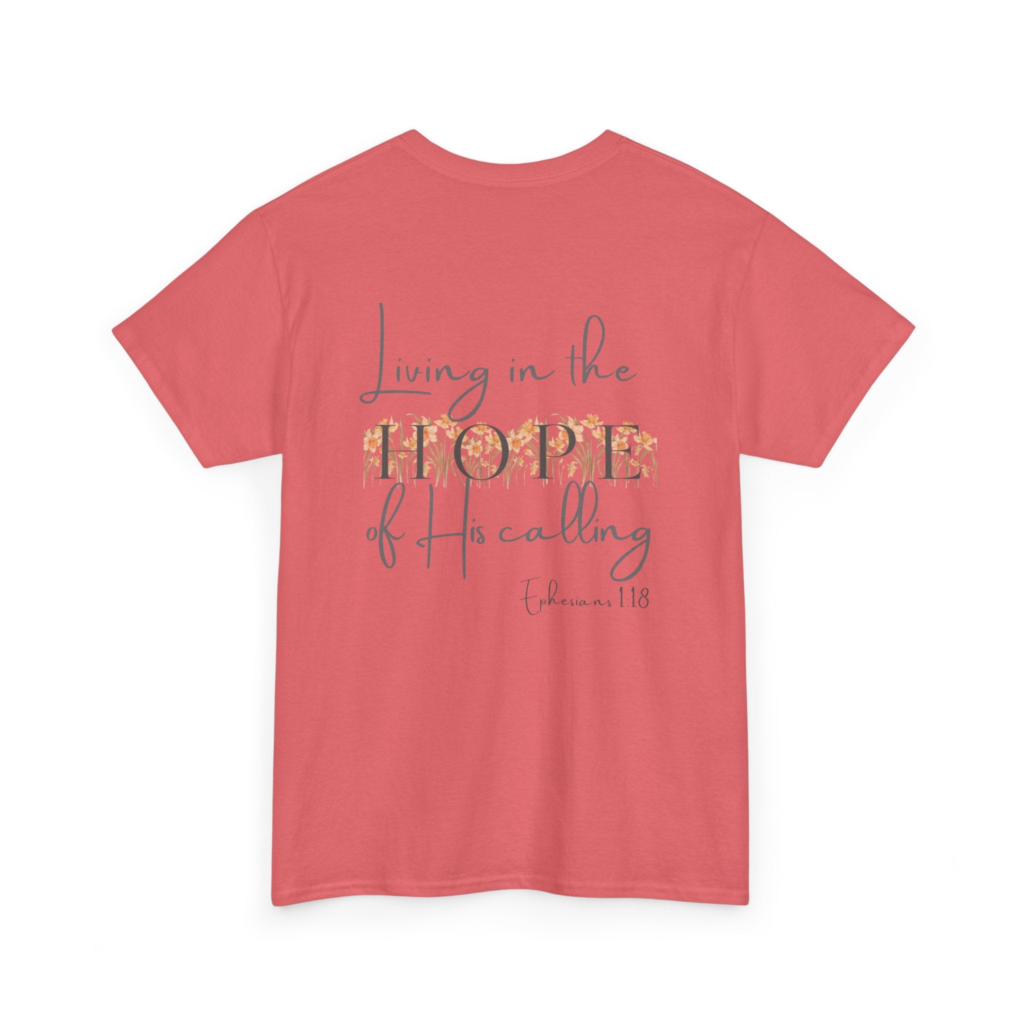 Coral Back of Christian t-shirt displaying the phrase "Living in the Hope of His Calling" with floral daffodil artwork and Ephesians 1:18 scripture reference.