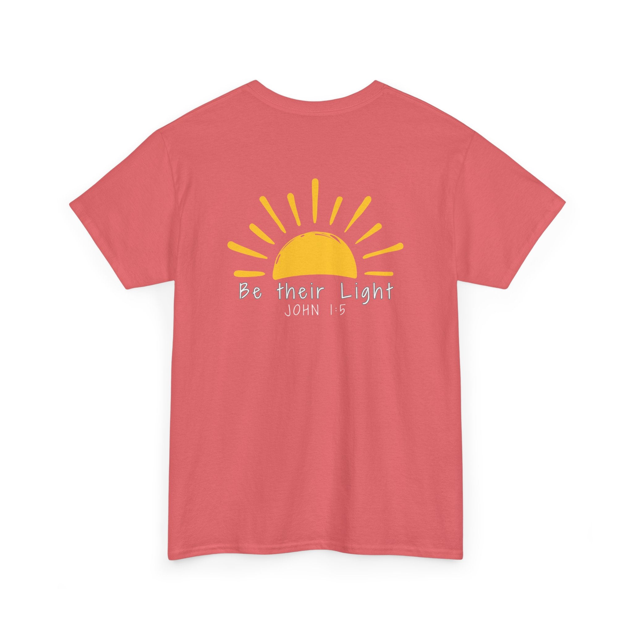 Coral Christian t-shirt with yellow sunshine graphic and “Be Their Light” John 1:5 Bible verse design