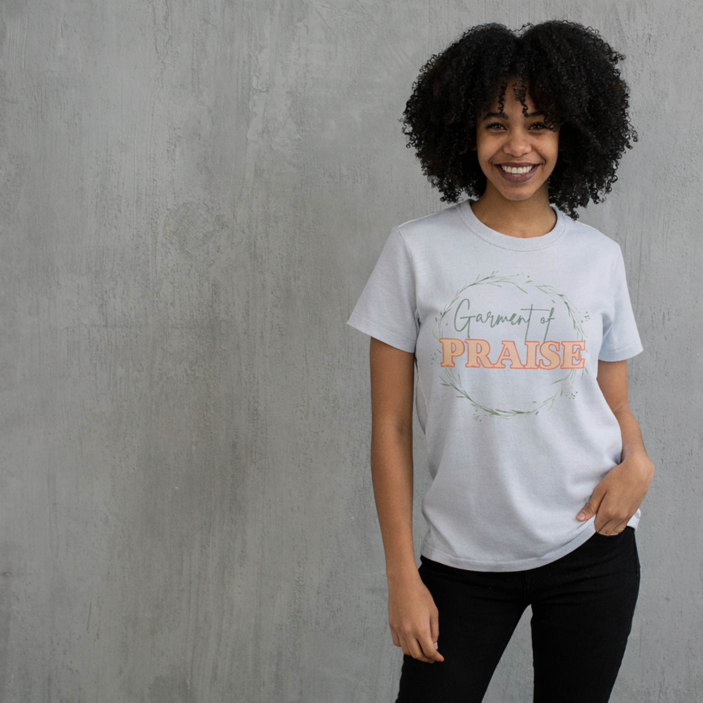 Woman wearing an ice gray "Garment of Praise" Christian t-shirt, faith-based apparel inspired by worship and scripture