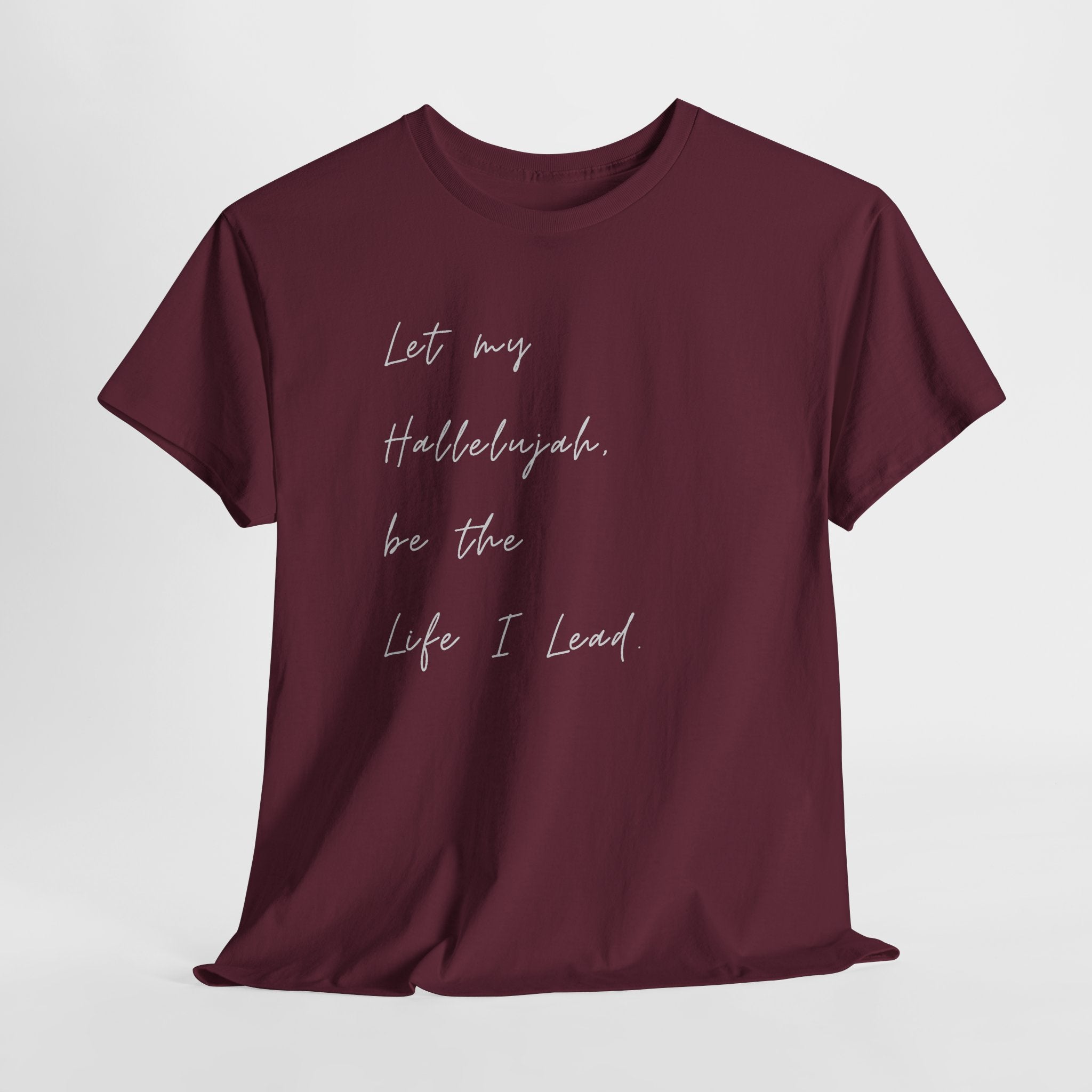 Maroon Christian t-shirt featuring the phrase "Let My Hallelujah Be the Life I Lead" in elegant black script on the front.