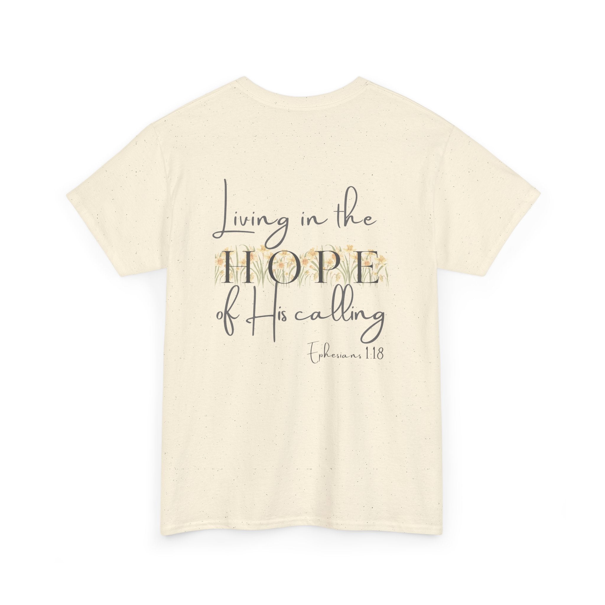 Natural Back of Christian t-shirt displaying the phrase "Living in the Hope of His Calling" with floral daffodil artwork and Ephesians 1:18 scripture reference.