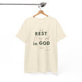 Natural t-shirt featuring the phrase “Find rest, O my soul in God alone” with “Psalm 62:5” displayed below, designed in soft sage green and neutral beige lettering for a calm, minimalist look.