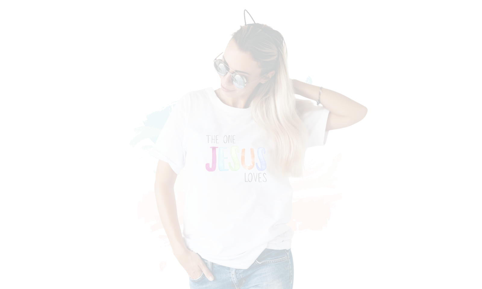 Model wearing The One Jesus Loves Christian t-shirt by A Moved Heart Collective on a white background