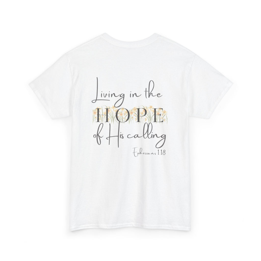 White Back of Christian t-shirt displaying the phrase "Living in the Hope of His Calling" with floral daffodil artwork and Ephesians 1:18 scripture reference.